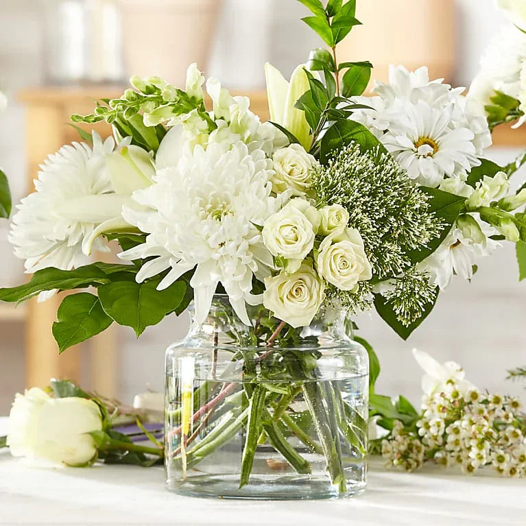 Ivory Elegance – A Signature Arrangement